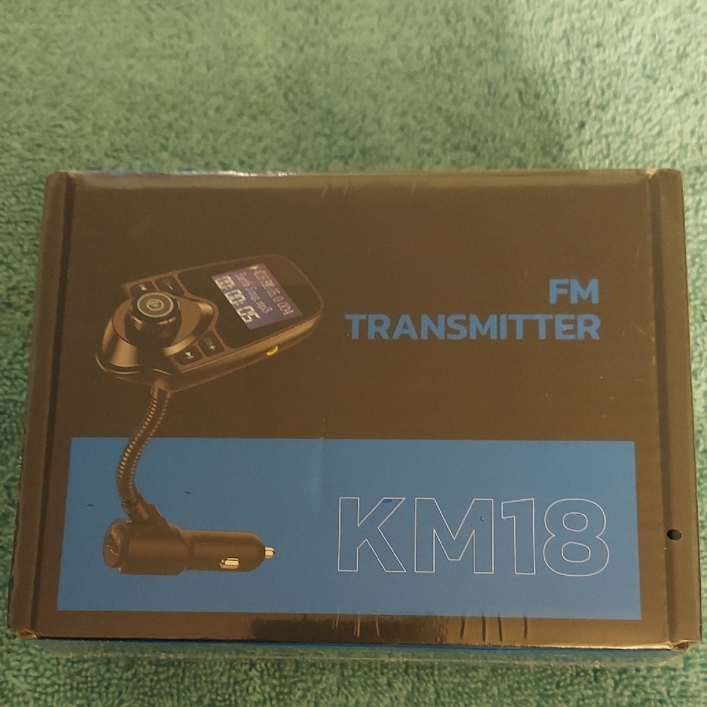 New In Box KM18 FM Transmitter For Vehicle